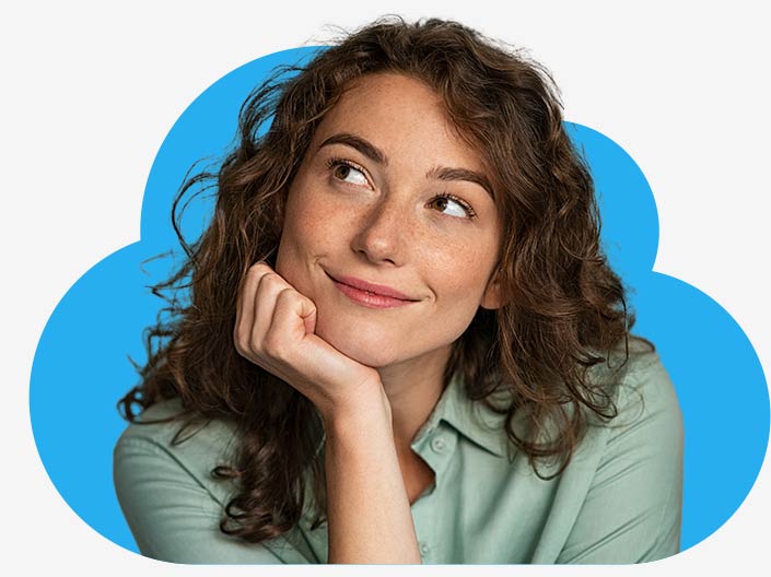 Woman with curly hair rests her chin on her hand and looks dreamily upwards - into the cloud. awisto migrates your CRM to the cloud.