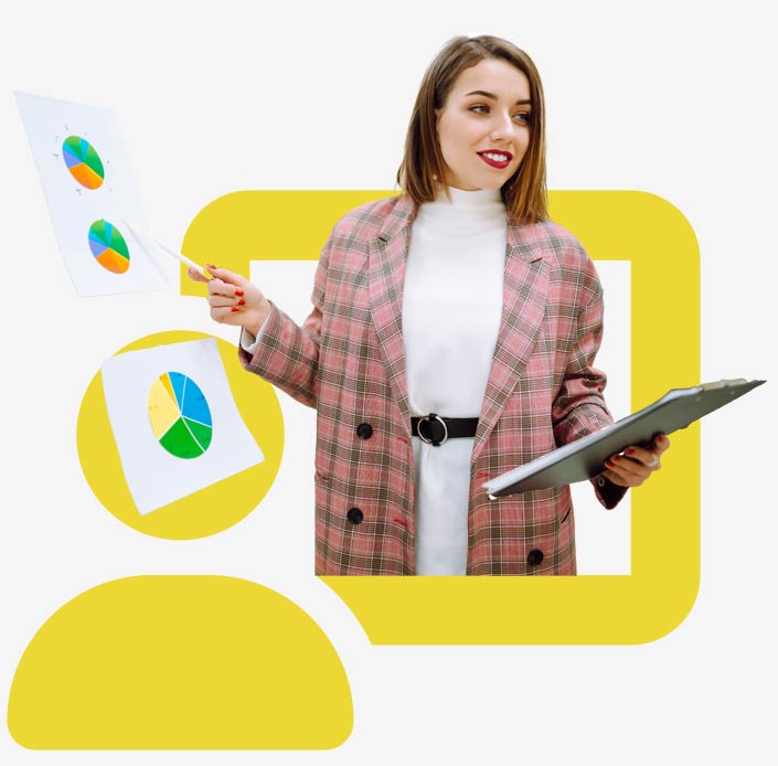 Young woman in plaid blazer pointing at diagrams. The image stands for CRM training by awisto.