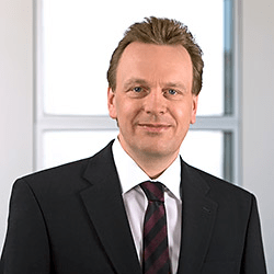 The photo is a portrait of Kaj Mähner, one of awisto's managing directors.